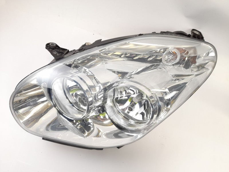 Recambio de faro izquierdo para fiat doblo ii cargo (263) furgón base referencia OEM IAM 46390711  
