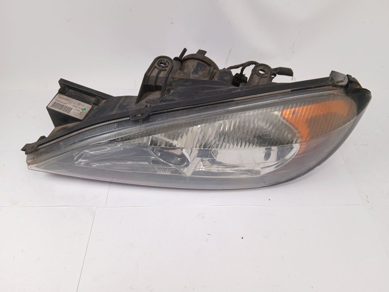 Recambio de faro izquierdo para nissan primera berlina (p11) 1.8 16v cat referencia OEM IAM 89003044  