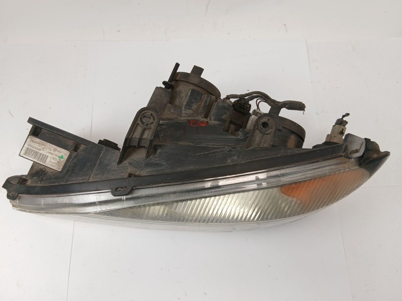 Recambio de faro izquierdo para nissan primera berlina (p11) 1.8 16v cat referencia OEM IAM 89003044  