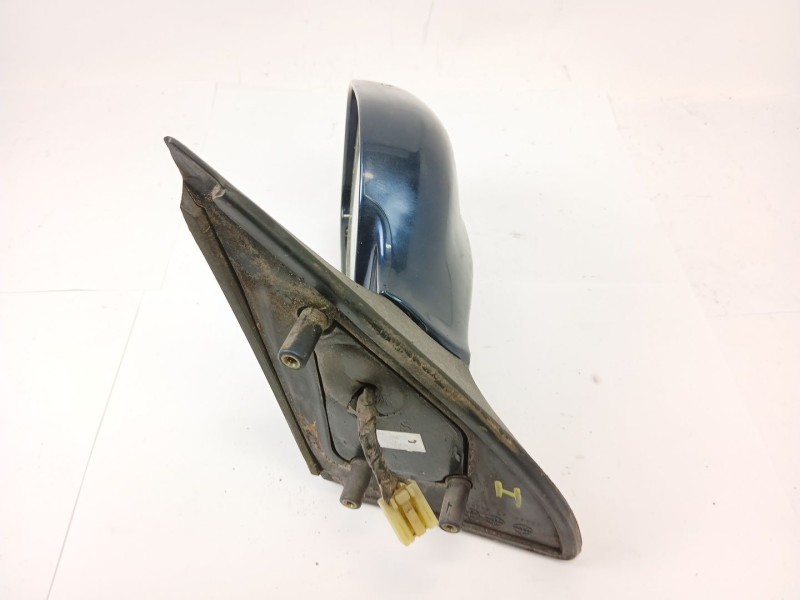 Recambio de retrovisor izquierdo para ssangyong musso 2.9 tdi grand lux referencia OEM IAM 015003  