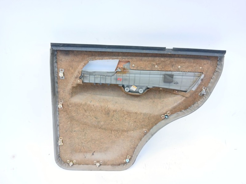 Recambio de guarnecido puerta trasera izquierda para ssangyong musso 2.9 tdi grand lux referencia OEM IAM   